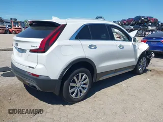 2020 Cadillac XT4 FWD Premium Luxury with VIN 1GYFZCR49LF138493, listed as a IAAI auction lot 41894823 with 49,000 mi miles and . Bid and sale history available at carsss.com. Image 4.