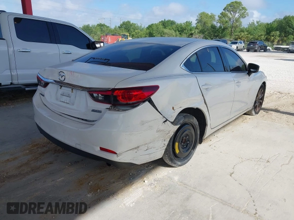 2017 Mazda Mazda6 Sport with VIN JM1GL1U54H1154203, listed as a IAAI auction lot 41917803 with 107,423 mi miles. Bid and sale history available at carsss.com. Image 4.
