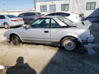 1989 Toyota MR2 z VIN JT2AW15C0K0146356, wystawiony jako Copart lot #76256644 z przebiegiem 294 380 mil mil oraz Tytuł czysty. Historia ofert i sprzedaży dostępna na DreamBid. Obrazek 2.