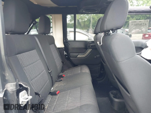 2012 Jeep Wrangler Unlimited Sport with VIN 1C4BJWDG8CL120308, listed as a IAAI auction lot 42365817 with 190,619 mi miles and . Bid and sale history available at DreamBid. Image 8.