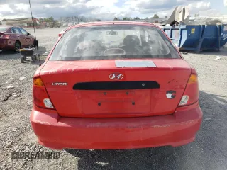 2003 Hyundai Accent with VIN KMHCF35C33U255489, listed as a Copart auction lot 75490604 with 219,457 mi miles and Salvage Title. Bid and sale history available at carsss.com. Image 6.