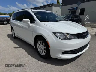 2020 Chrysler Voyager LXI with VIN 2C4RC1DG9LR144605, listed as a Copart auction lot 54107585 with 140,575 mi miles and Salvage Title. Bid and sale history available at carsss.com. Image 4.