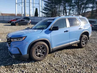 2024 Honda Pilot TrailSport with VIN 5FNYG1H6XRB023507, listed as a Copart auction lot 81461214 with 12,036 mi miles and Salvage Title. Bid and sale history available at carsss.com. Image 1.