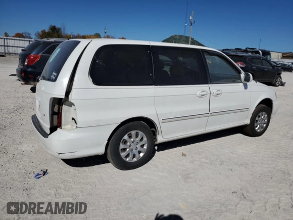 2004 Kia Sedona LX with VIN KNDUP131046585706, listed as a Copart auction lot 74973304 with 107,130 mi miles and Salvage Title. Bid and sale history available at carsss.com. Image 3.