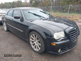 2008 Chrysler 300 C SRT-8 z VIN 2C3KA73W18H245528, wystawiony jako IAAI lot #40807465 z przebiegiem 151 649 mil mil oraz . Historia ofert i sprzedaży dostępna na DreamBid. Obrazek 1.