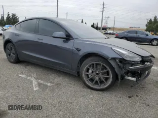 2023 Tesla Model 3 with VIN 5YJ3E1EA4PF642769, listed as a Copart auction lot 50648825 with 25,310 mi miles and Salvage title. Bid and sale history available at DreamBid. Image 4.