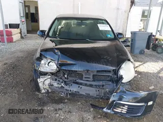 2008 Volkswagen Jetta S z VIN 3VWJM71K68M037948, wystawiony jako IAAI lot #42160416 z przebiegiem 170 381 mil mil oraz . Historia ofert i sprzedaży dostępna na DreamBid. Obrazek 13.