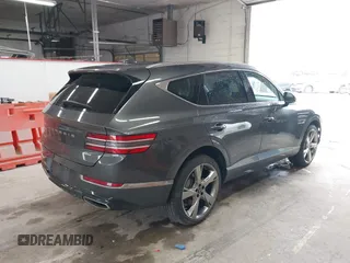 2023 Genesis GV80 with VIN KMUHBDSBXPU112470, listed as a IAAI auction lot 42326878 with 28,302 mi miles and . Bid and sale history available at DreamBid. Image 4.