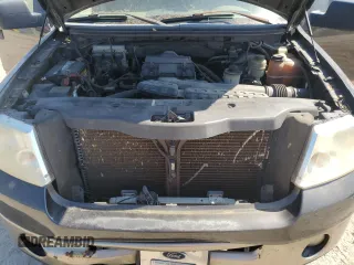 2006 Ford F-150 XLT with VIN 1FTPW12566FA46546, listed as a Copart auction lot 52697455 with 153,515 mi miles and Salvage Title. Bid and sale history available at DreamBid. Image 11.