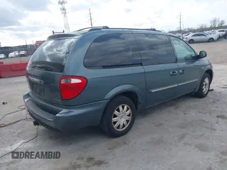 2006 Chrysler Town & Country LWB Touring with VIN 2A4GP54LX6R693048, listed as a IAAI auction lot 41887949 with 187,000 mi miles. Bid and sale history available at carsss.com. Image 4.