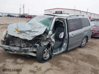2005 Honda Odyssey EX-L with VIN 5FNRL38755B092104, listed as a IAAI auction lot 41567629 with 1 mi miles. Bid and sale history available at carsss.com. Image 2.