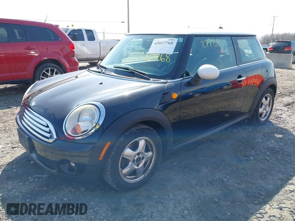 2007 MINI Hardtop with VIN WMWMF33567TT53664, listed as a IAAI auction lot 42027768 with 75,970 mi miles and . Bid and sale history available at DreamBid. Image 2.