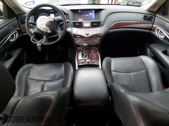 2015 Infiniti Q70 with VIN JN1BY1APXFM540740, listed as a Copart auction lot 55479495 with 140,344 mi miles and Salvage title. Bid and sale history available at DreamBid. Image 8.
