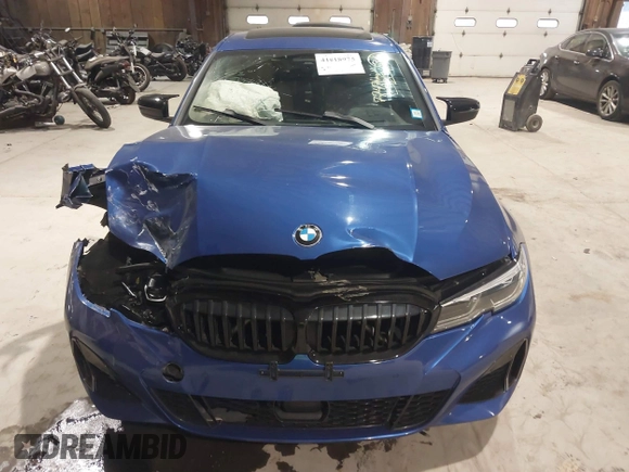 2021 BMW 3 Series M340i with VIN 3MW5U7J03M8B49500, listed as a IAAI auction lot 41018975 with 77,471 mi miles. Bid and sale history available at carsss.com. Image 12.
