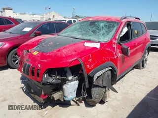 2019 Jeep Cherokee Trailhawk Elite with VIN 1C4PJMBX8KD305108, listed as a IAAI auction lot 41763970 with 70,705 mi miles. Bid and sale history available at carsss.com. Image 16.