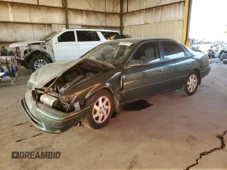 2001 Toyota Camry LE z VIN JT2BF22K510303027, wystawiony jako Copart lot #85090174 z przebiegiem 253 038 mil mil oraz Szkoda całkowita • Salvage title. Historia ofert i sprzedaży dostępna na DreamBid. Obrazek 1.