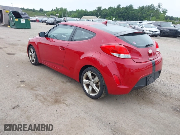 2013 Hyundai Veloster w/Gray Int with VIN KMHTC6AD0DU145090, listed as a IAAI auction lot 42618390 with 126,641 mi miles and . Bid and sale history available at DreamBid. Image 3.
