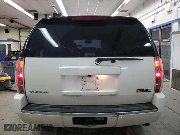 2014 GMC Yukon Denali with VIN 1GKS2EEF6ER141112, listed as a Copart auction lot 88526685 with 142,248 mi miles and Salvage Title. Bid and sale history available at carsss.com. Image 6.