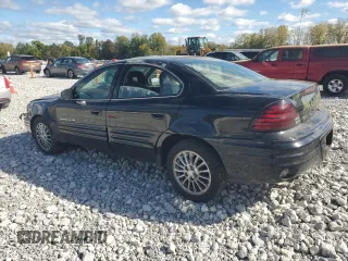 1999 Pontiac Grand Am SE2 with VIN 1G2NE52E2XM732523, listed as a Copart auction lot 75420684 with 124,110 mi miles and Salvage Title. Bid and sale history available at carsss.com. Image 2.