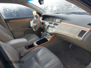 2007 Toyota Avalon XL z VIN 4T1BK36B87U178296, wystawiony jako IAAI lot #42187704 z przebiegiem 241 758 mil mil oraz . Historia ofert i sprzedaży dostępna na DreamBid. Obrazek 5.