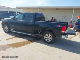 2013 GMC Sierra 1500 SLT with VIN 3GTP2WE71DG146605, listed as a IAAI auction lot 41334159 with 224,640 mi miles. Bid and sale history available at carsss.com. Image 3.