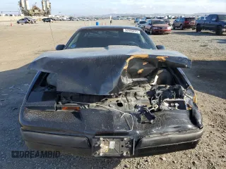 1989 Pontiac Firebird z VIN 1G2FS2186KL212458, wystawiony jako Copart lot #56995025 z przebiegiem 89 851 mil mil oraz Szkoda całkowita • Salvage title. Historia ofert i sprzedaży dostępna na DreamBid. Obrazek 5.
