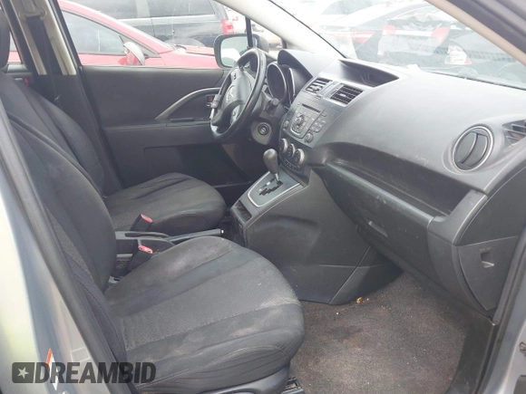2012 Mazda 5 Sport with VIN JM1CW2BL0C0111151, listed as a IAAI auction lot 42359887 with 158,986 mi miles and . Bid and sale history available at DreamBid. Image 5.
