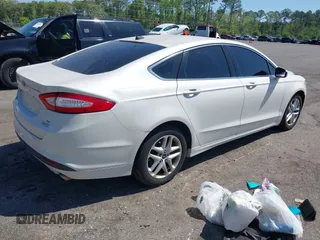 2014 Ford Fusion SE with VIN 3FA6P0HD1ER161452, listed as a IAAI auction lot 42037684 with 166,634 mi miles. Bid and sale history available at carsss.com. Image 4.