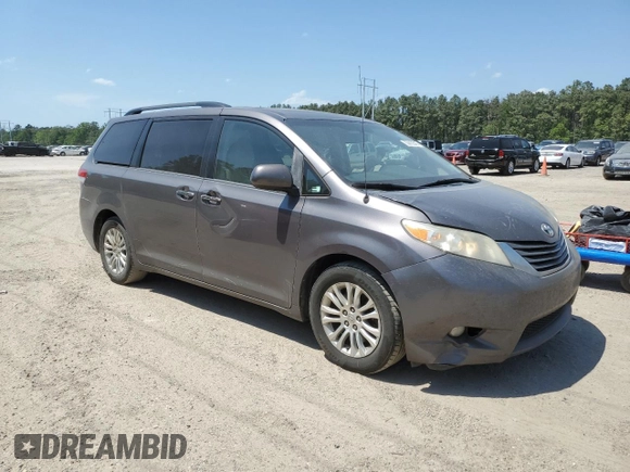 2014 Toyota Sienna XLE with VIN 5TDYK3DC6ES473747, listed as a Copart auction lot 53828345 with 251,390 mi miles and Clean Title. Bid and sale history available at carsss.com. Image 4.