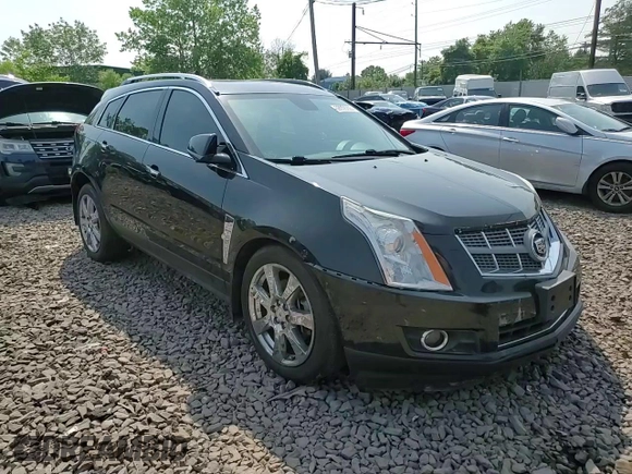 2011 Cadillac SRX Premium Collection z VIN 3GYFNFEY9BS606335, wystawiony jako Copart lot #59009285 z przebiegiem 152 828 mil mil oraz Szkoda całkowita • Salvage title. Historia ofert i sprzedaży dostępna na DreamBid. Obrazek 14.