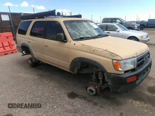 1998 Toyota 4Runner SR5 z VIN JT3HN86R3W0177146, wystawiony jako IAAI lot #42073056 z przebiegiem 318 147 mil mil oraz . Historia ofert i sprzedaży dostępna na DreamBid. Obrazek 6.