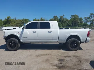 2019 Ram 2500 Laramie z VIN 3C6UR5NL2KG718789, wystawiony jako IAAI lot #42046325 z przebiegiem 54 965 mil mil oraz . Historia ofert i sprzedaży dostępna na DreamBid. Obrazek 15.