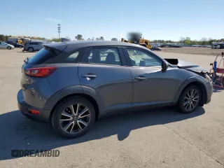2017 Mazda CX-3 Touring z VIN JM1DKFC72H0167351, wystawiony jako Copart lot #56230945 z przebiegiem 78 894 mil mil oraz Szkody całkowita. Historia ofert i sprzedaży dostępna na DreamBid. Obrazek 3.