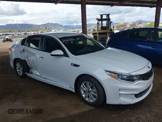 2016 Kia Optima LX with VIN 5XXGT4L3XGG119847, listed as a IAAI auction lot 41789193 with 62,804 mi miles. Bid and sale history available at carsss.com. Image 13.