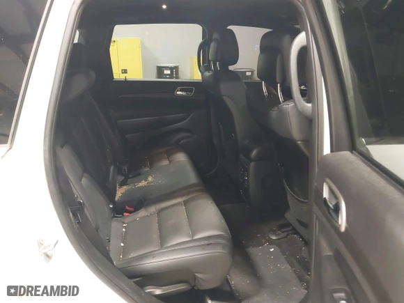 2018 Jeep Grand Cherokee Laredo E with VIN 1C4RJFAG0JC105804, listed as a IAAI auction lot 41587036 with 107,601 mi miles. Bid and sale history available at carsss.com. Image 8.