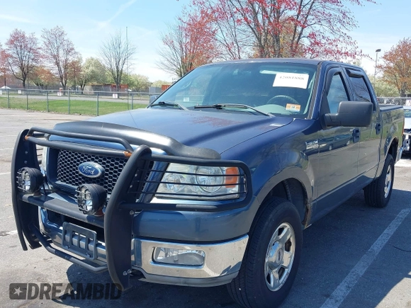 2004 Ford F-150 XLT with VIN 1FTRW14W24KA27415, listed as a IAAI auction lot 42081888 with 149,897 mi miles. Bid and sale history available at carsss.com. Image 2.