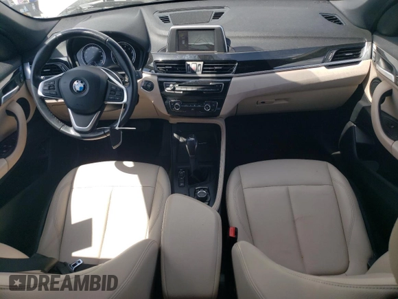 2018 BMW X1 xDrive28i with VIN WBXHT3C35J5L26952, listed as a Copart auction lot 51715035 with 63,306 mi miles and Salvage Title. Bid and sale history available at carsss.com. Image 8.