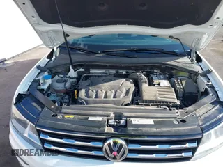 2020 Volkswagen Tiguan S with VIN 3VV1B7AXXLM036994, listed as a IAAI auction lot 42643035 with 62,676 mi miles and . Bid and sale history available at DreamBid. Image 10.
