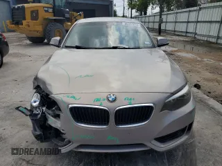2015 BMW 2 Series 228i with VIN WBA1F5C51FV257605, listed as a Copart auction lot 50991415 with 122,396 mi miles and Salvage Title. Bid and sale history available at carsss.com. Image 5.