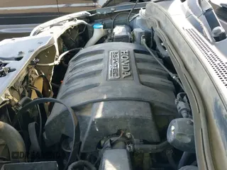 2006 Honda Pilot EX-L with VIN 5FNYF28796B026606, listed as a IAAI auction lot 41612560 with 224,577 mi miles and . Bid and sale history available at DreamBid. Image 18.