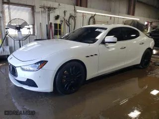 2014 Maserati Ghibli S Q4 with VIN ZAM57RTA4E1117703, listed as a Copart auction lot 48754515 with 104,284 mi miles and Salvage Title. Bid and sale history available at carsss.com. Image 1.