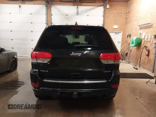 2015 Jeep Grand Cherokee Limited with VIN 1C4RJFBG8FC910133, listed as a IAAI auction lot 41289929 with 141,226 mi miles. Bid and sale history available at carsss.com. Image 16.