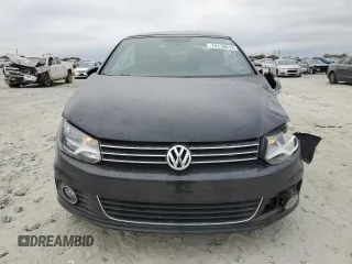 2015 Volkswagen Eos Komfort with VIN WVWBW8AH6FV005693, listed as a Copart auction lot 79176614 with 106,556 mi miles and Salvage Title. Bid and sale history available at DreamBid. Image 5.