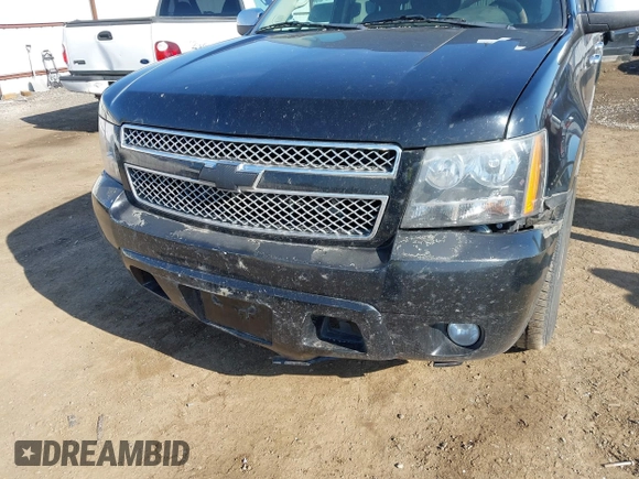 2012 Chevrolet Suburban LTZ with VIN 1GNSKKE74CR324578, listed as a IAAI auction lot 42129334 with 182,655 mi miles. Bid and sale history available at carsss.com. Image 6.