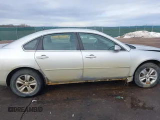 2013 Chevrolet Impala LS with VIN 2G1WF5E31D1154096, listed as a IAAI auction lot 41649749 with 204,860 mi miles and . Bid and sale history available at DreamBid. Image 14.