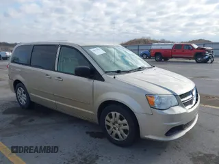 2015 Dodge Grand Caravan SE with VIN 2C4RDGBG3FR658800, listed as a IAAI auction lot 41874702 with 282,667 mi miles and . Bid and sale history available at DreamBid. Image 1.
