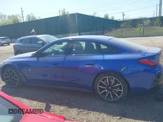 2024 BMW i4 M50 z VIN WBY33AW09RFS60679, wystawiony jako IAAI lot #41983706 z przebiegiem 2665 mil mil oraz . Historia ofert i sprzedaży dostępna na DreamBid. Obrazek 14.