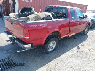 2001 Ford F-150 XL with VIN 1FTRX18L91NB88500, listed as a IAAI auction lot 42096189 with Not provided miles and . Bid and sale history available at DreamBid. Image 4.