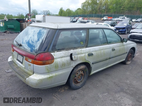 1998 Subaru Legacy L z VIN 4S3BK4353W7300794, wystawiony jako IAAI lot #42205793 z przebiegiem 227 539 mil mil oraz . Historia ofert i sprzedaży dostępna na DreamBid. Obrazek 4.
