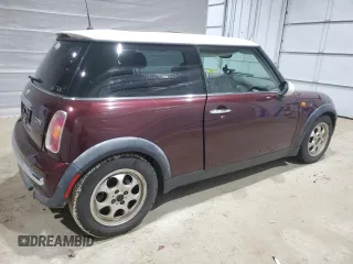 2002 MINI Hardtop with VIN WMWRC33402TC36986, listed as a Copart auction lot 50131045 with 194,224 mi miles and Salvage Title. Bid and sale history available at DreamBid. Image 3.